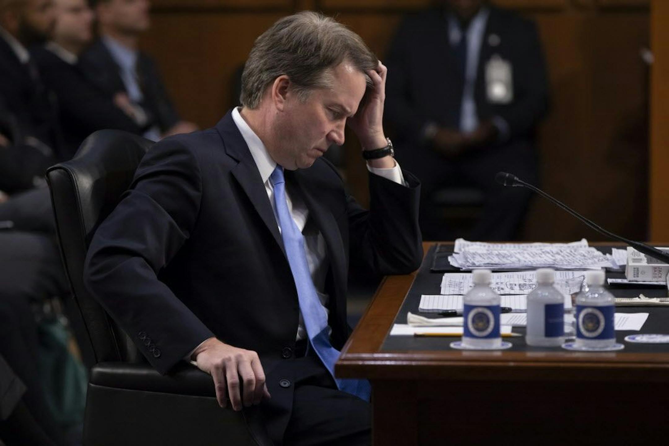 After more than an hour of delay over procedural questions, President Donald Trump's Supreme Court nominee, Brett Kavanaugh, waits to testify before the Senate Judiciary Committee for the third day of his confirmation hearing, on Capitol Hill in Washington, Thursday, Sept. 6, 2018.