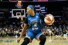 Minnesota Lynx's Odyssey Sims (1) dribbles during a WNBA basketball game between Los Angeles Sparks and Minnesota Lynx in Los Angeles, Sunday, Sept. 8