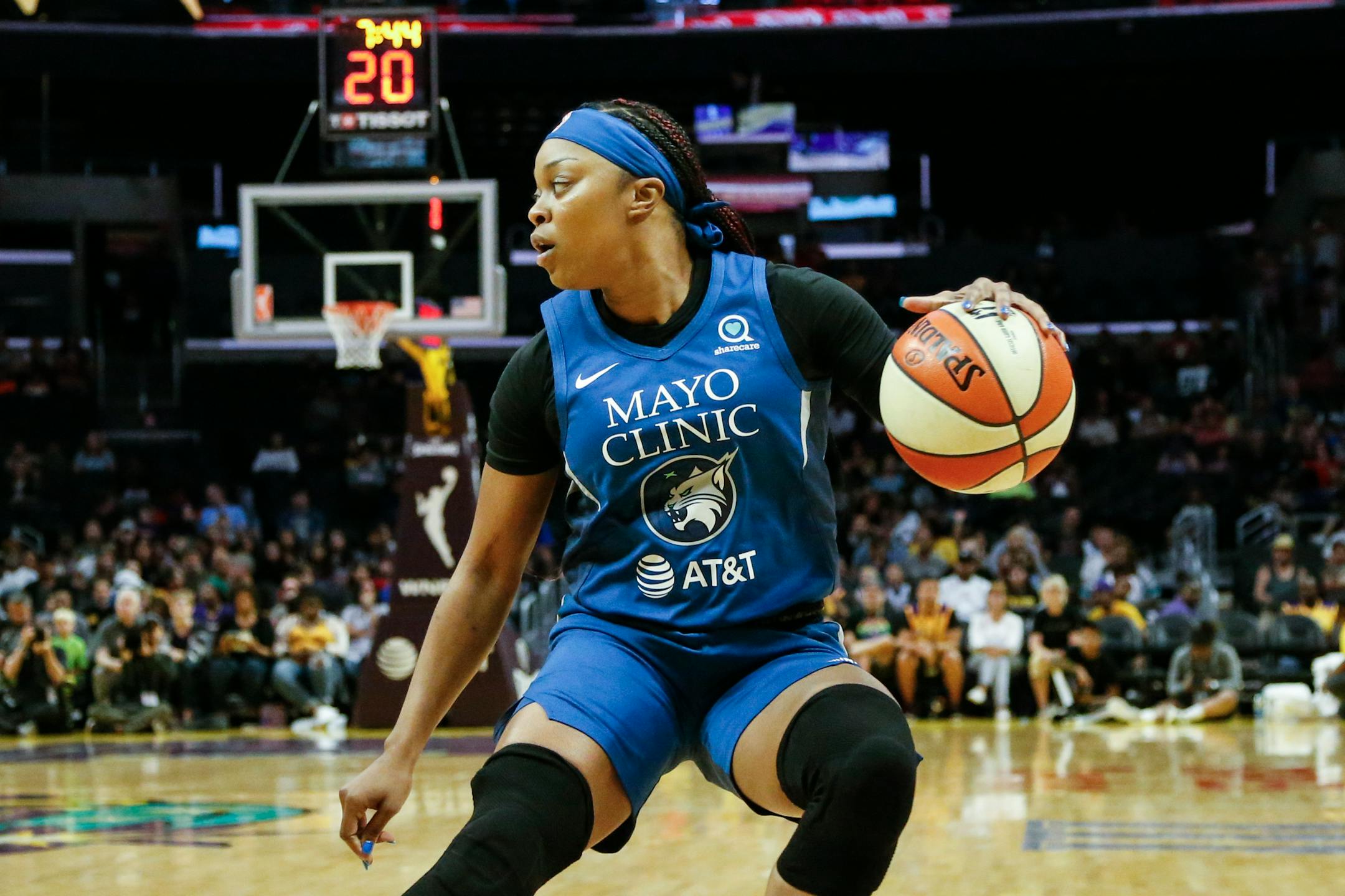 Minnesota Lynx's Odyssey Sims (1) dribbles during a WNBA basketball game between Los Angeles Sparks and Minnesota Lynx in Los Angeles, Sunday, Sept. 8, 2019. The Sparks won 77-68. (AP Photo/Ringo H.W. Chiu)