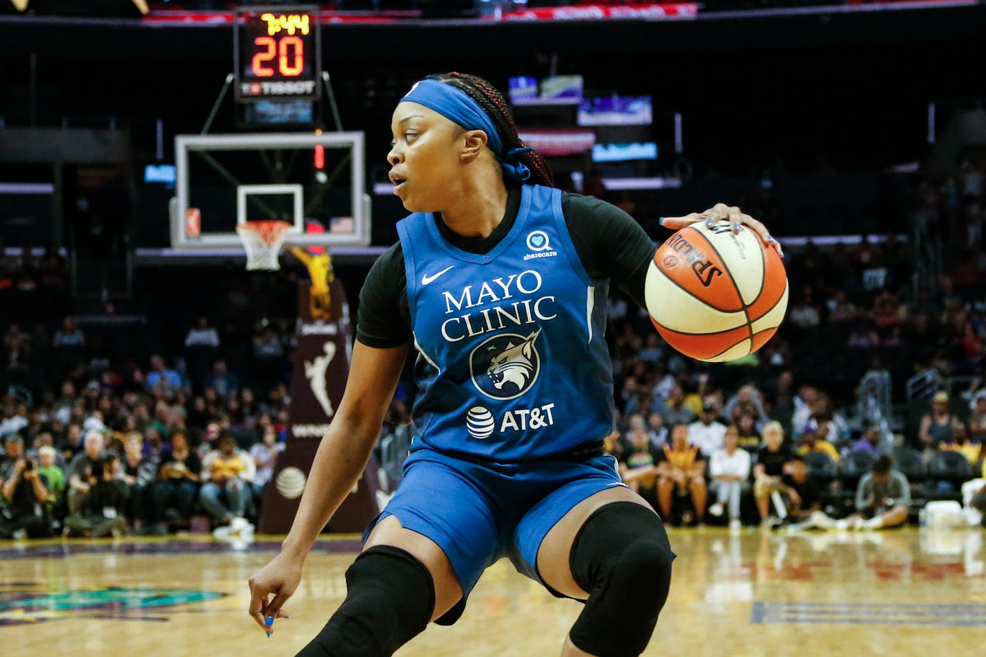 Minnesota Lynx's Odyssey Sims (1) dribbles during a WNBA basketball game between Los Angeles Sparks and Minnesota Lynx in Los Angeles, Sunday, Sept. 8, 2019. The Sparks won 77-68. (AP Photo/Ringo H.W. Chiu)