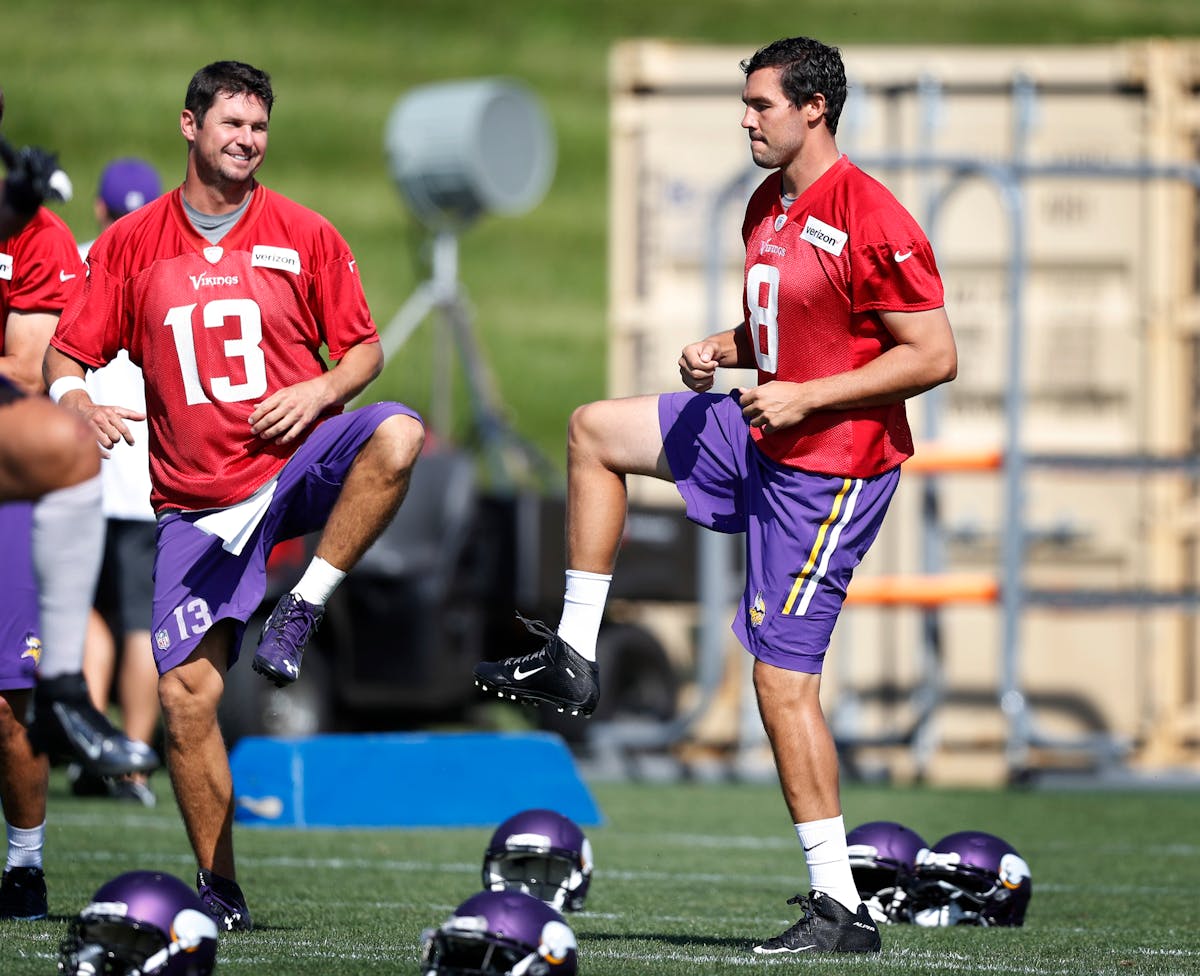 Vikings coach Mike Zimmer hasn't yet decided if Shaun Hill, left, or Sam Bradford will start at quarterback in the season opener against Tennessee.