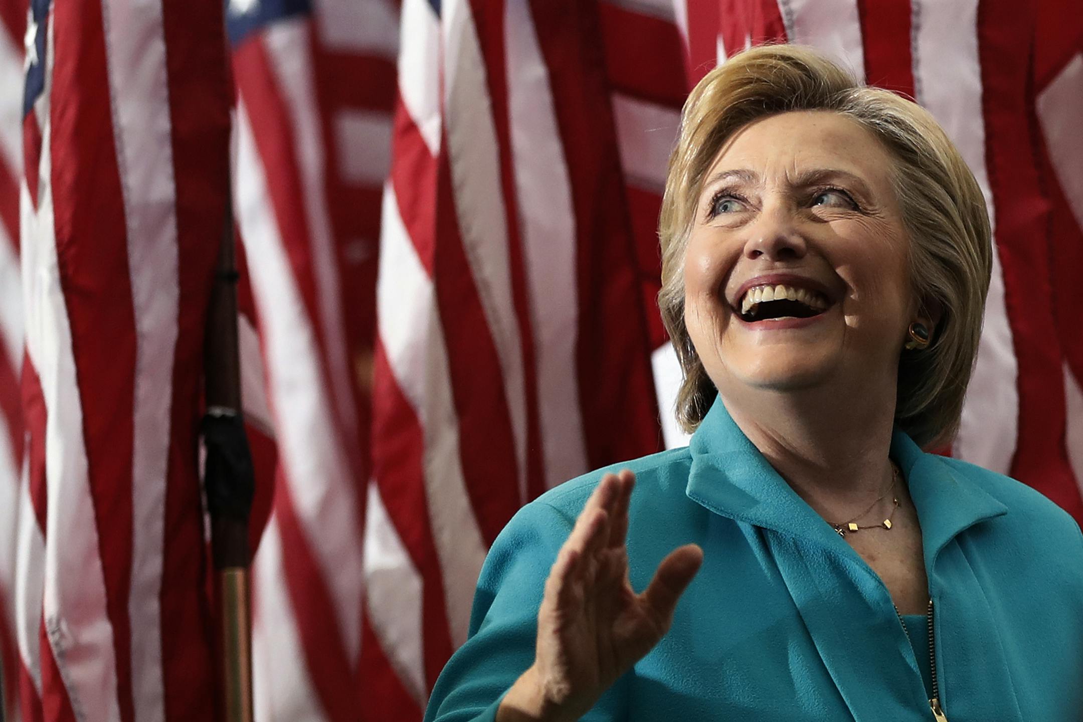 Democratic presidential candidate Hillary Clinton looks up to audience members as she leaves a campaign event at Truckee Meadows Community College in Reno, Nev., Thursday, Aug. 25, 2016. Clinton enters Labor Day with an edge over rival Donald Trump in a series of battleground states. But she still faces major challenges with voters who view her as untrustworthy. (AP Photo/Carolyn Kaster)
