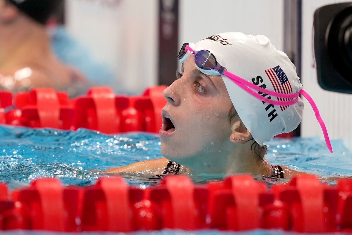Regan Smith of United States looks up following her heat in the women’s 100-meter backstroke at the 2020 Summer Olympics, Sunday, July 25, 2021, in 