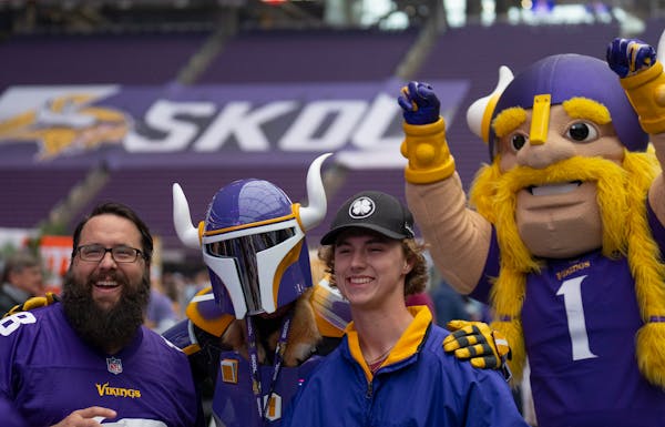 Vikings mascot Viktor photobombed some fans during the team’s draft party on Thursday.