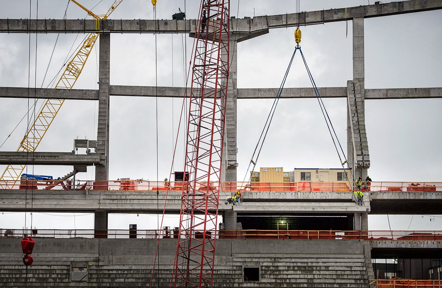 A concrete seating section panel is moved into position in the new Vikings stadium. Thursday, May 14, 2015 Construction update of the new Vikings stadium, Minneapolis, MN