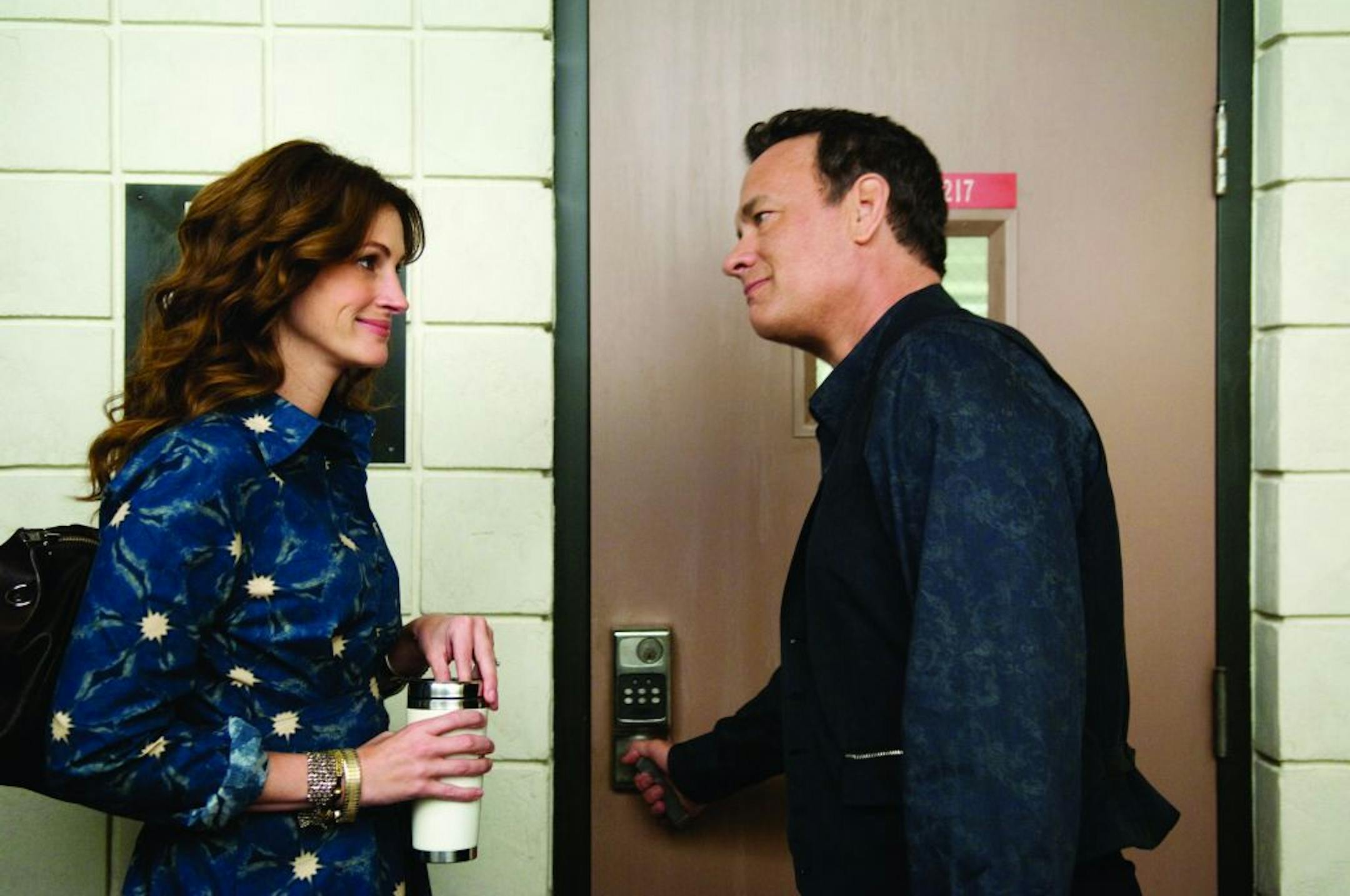 Julia Roberts plays a speech teacher, and Tom Hanks is a laid-off worker who returns to school in "Larry Crowne."