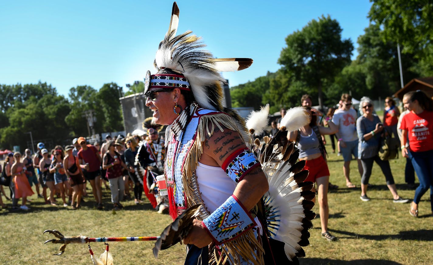 Reuben Crow Feather, with the Standing Rock Sioux Tribe, helped lead a round dance in a powwow Saturday at the Eaux Claires Music and Art Festival. ] AARON LAVINSKY &#xef; aaron.lavinsky@startribune.com Day two of the Eaux Claires Music & Art Festival was held Saturday, July 7, 2018 at Foster Farms in Eau Claire, Wisc.