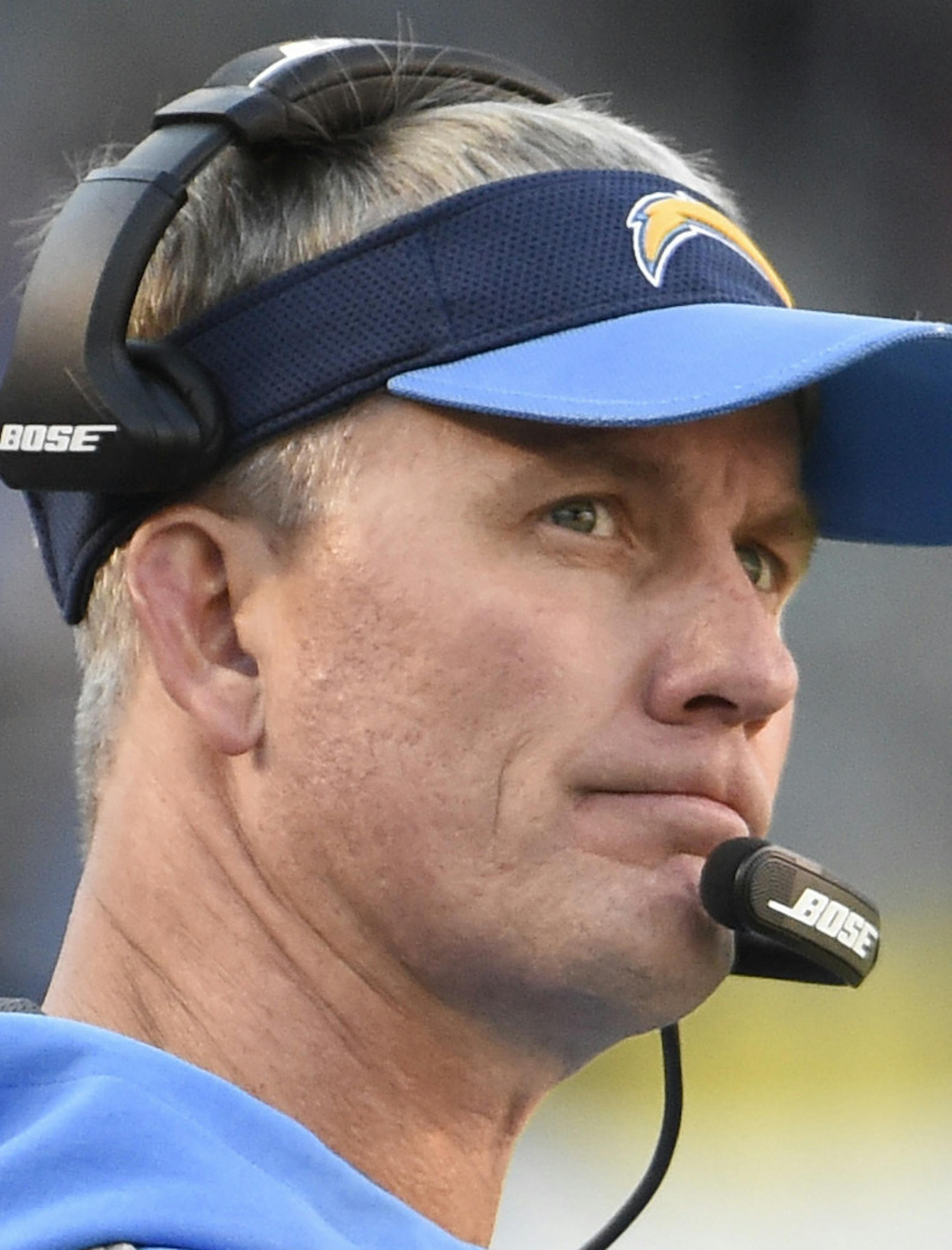 FILE - In this Sunday, Dec. 18, 2016, file photo, San Diego Chargers coach Mike McCoy watches during the second half of the team's NFL football game against the Oakland Raiders in San Diego. What totally different experiences the Kansas City Chiefs and the Chargers could have Sunday afternoon, Jan. 1, at Qualcomm Stadium. Already in the playoffs for the third time in four years, Alex Smith and the Chiefs (11-4) need to beat the Chargers (5-10) and have the Denver Broncos beat the Oakland Raiders