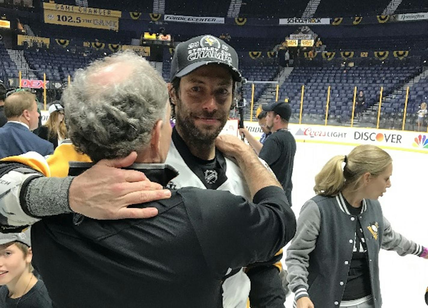 Matt Cullen got a hug from his father Terry after Pittsburgh won the Stanley Cup last season.