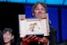 Sean Baker holds the Palme d'Or for the film 'Anora,' during the awards ceremony of the 77th international film festival, Cannes, southern France, Sat