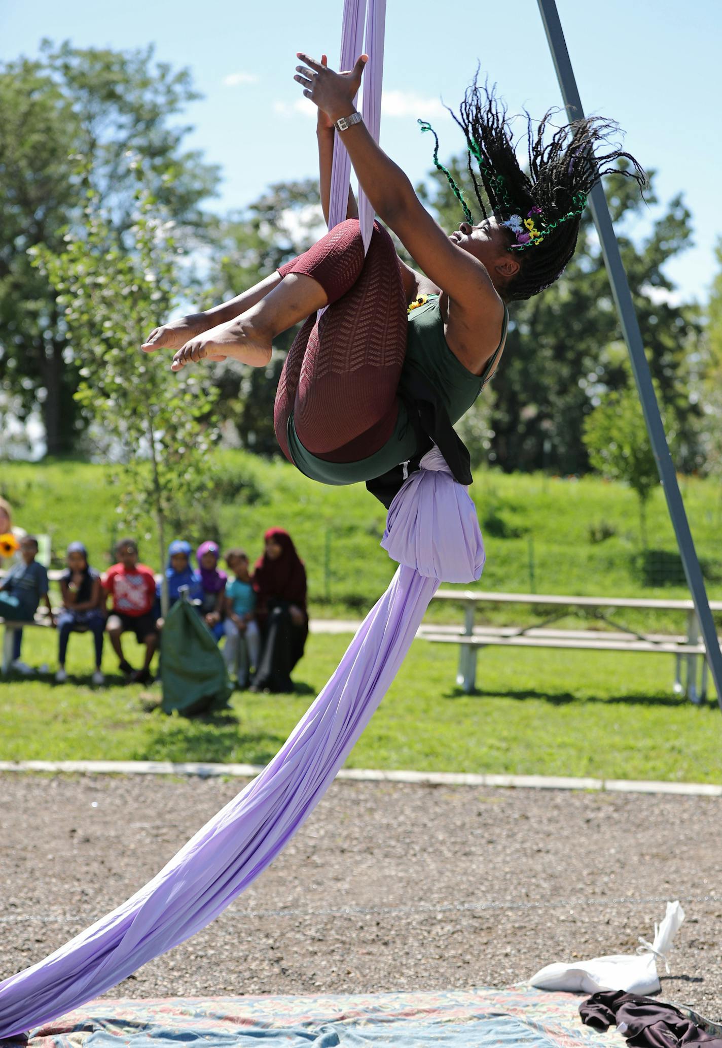 Nastaaja Johnson shared her talents on the aerial silks during the Frogtown Farms festival. ] Shari L. Gross &#xef; shari.gross@startribune.com The Minnesota Superbowl Committee is giving $50,000 to St. Paul's Frogtown Farm to develop an outdoor kitchen and other features. The money is meant to encourage health and wellness in Minnesota and is part of $2 million granted to Minnesota organizations from the Super Bowl folks. Photographed Tuesday, August 22, 2017.