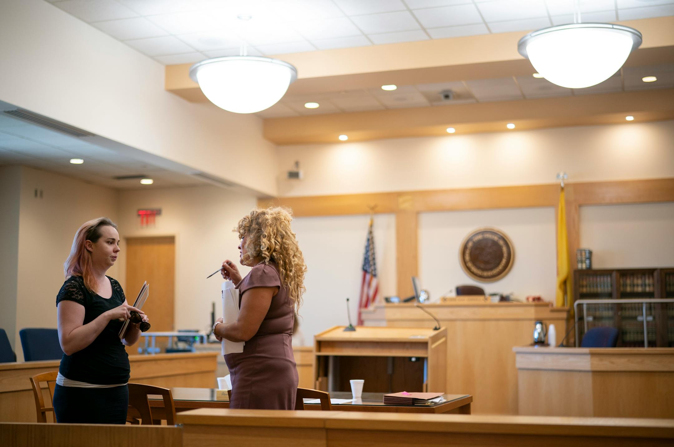 Gabrielle Valdez talked with Elspeth Owen after her request to sell some of her structured settlement payments was postponed during a hearing before Bernalillo County Judge Clay Campbell in September.    ]   JEFF WHEELER • Jeff.Wheeler@startribune.com