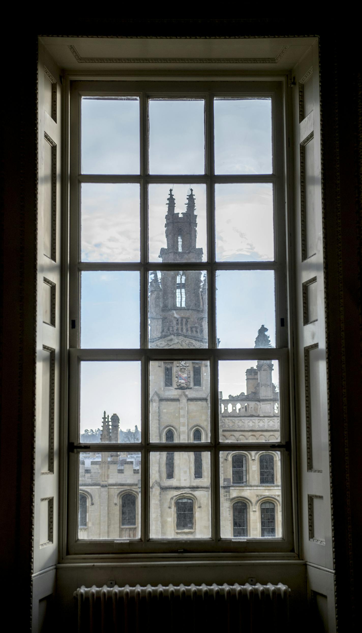 A tower of All Souls College as seen from inside Radcliffe Camera in Oxford, England, March 4, 2014. Inspiring writers for centuries, Oxford, the ultimate university town, beguiles even those of a less scholarly bent. (Andrew Testa/The New York Times) -- PHOTO MOVED IN ADVANCE AND NOT FOR USE - ONLINE OR IN PRINT - BEFORE MARCH 23, 2014. ORG XMIT: XNYT107