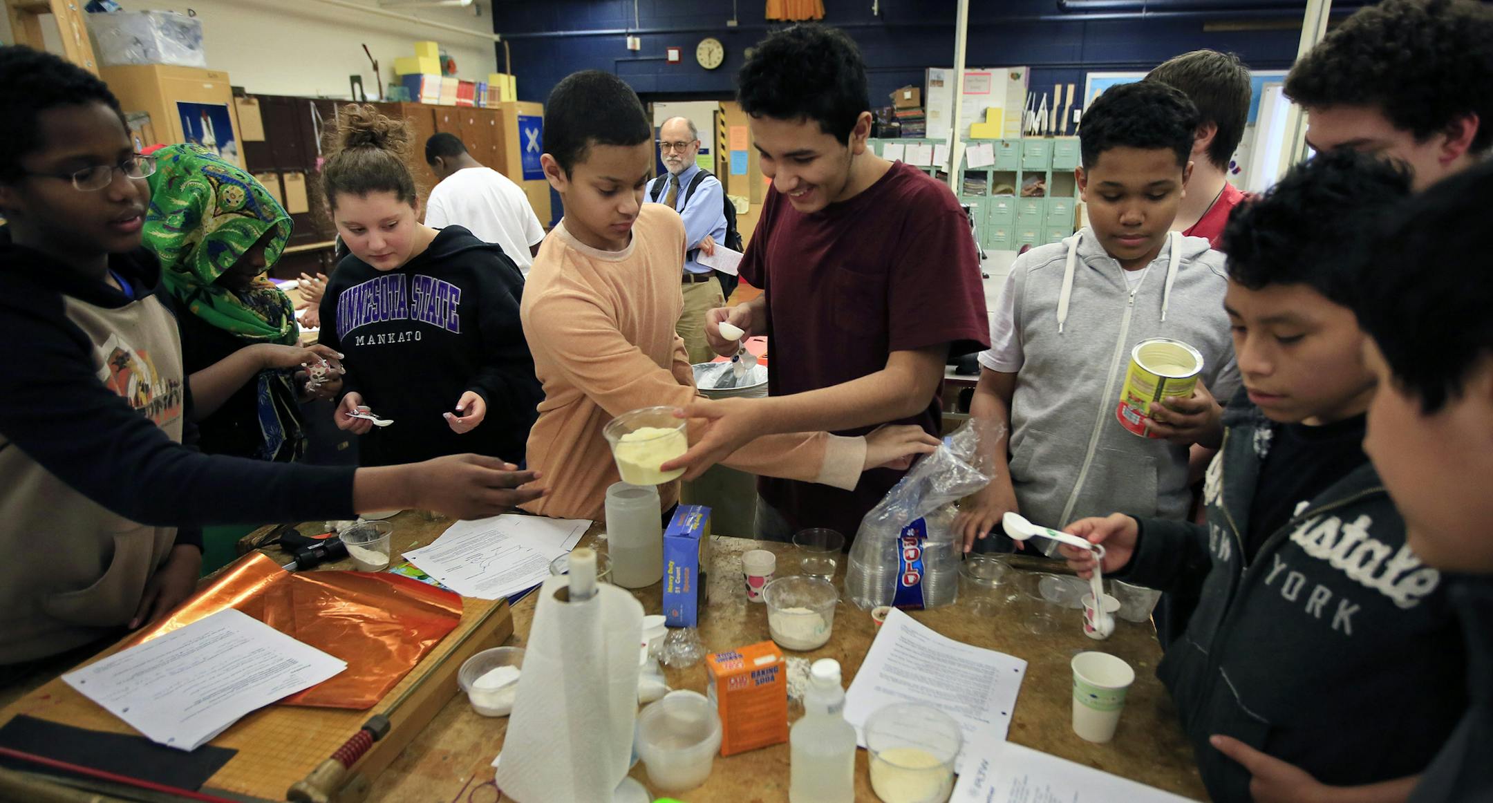 Students in Chad Koppenhaver 8th grade Science of Technology class work on making glue for an adhesion experiment. This quarter students had an opportunity to work with a STEAM initiative (Science, Technology, Engineering, Arts, Math) with University of Minnesota Chemistry (institute of polymers) and MCAD illustration students. ] Fifteen years ago, when Meredith Davis arrived at Sanford Middle School in Minneapolis, her mother's alma mater attracted hardly any of its neighborhood's kids. It had