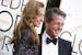 Hugh Grant and Anna Elisabet Eberstein arrive at the 74th Annual Golden Globe Awards show at the Beverly Hilton Hotel in Beverly Hills, Calif., on Sun