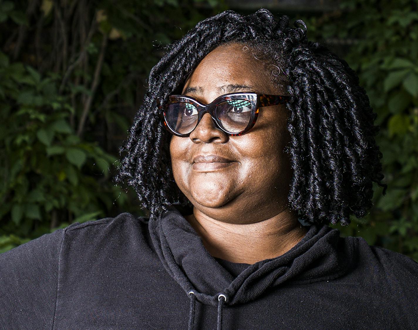 Therapist Felicia Sy poses in front of the Ivy Building, where she can't use her office because riots made the building uninhabitable for now.] RICHARD TSONG-TAATARII ¥ richard.tsong-taatarii@startribune.com