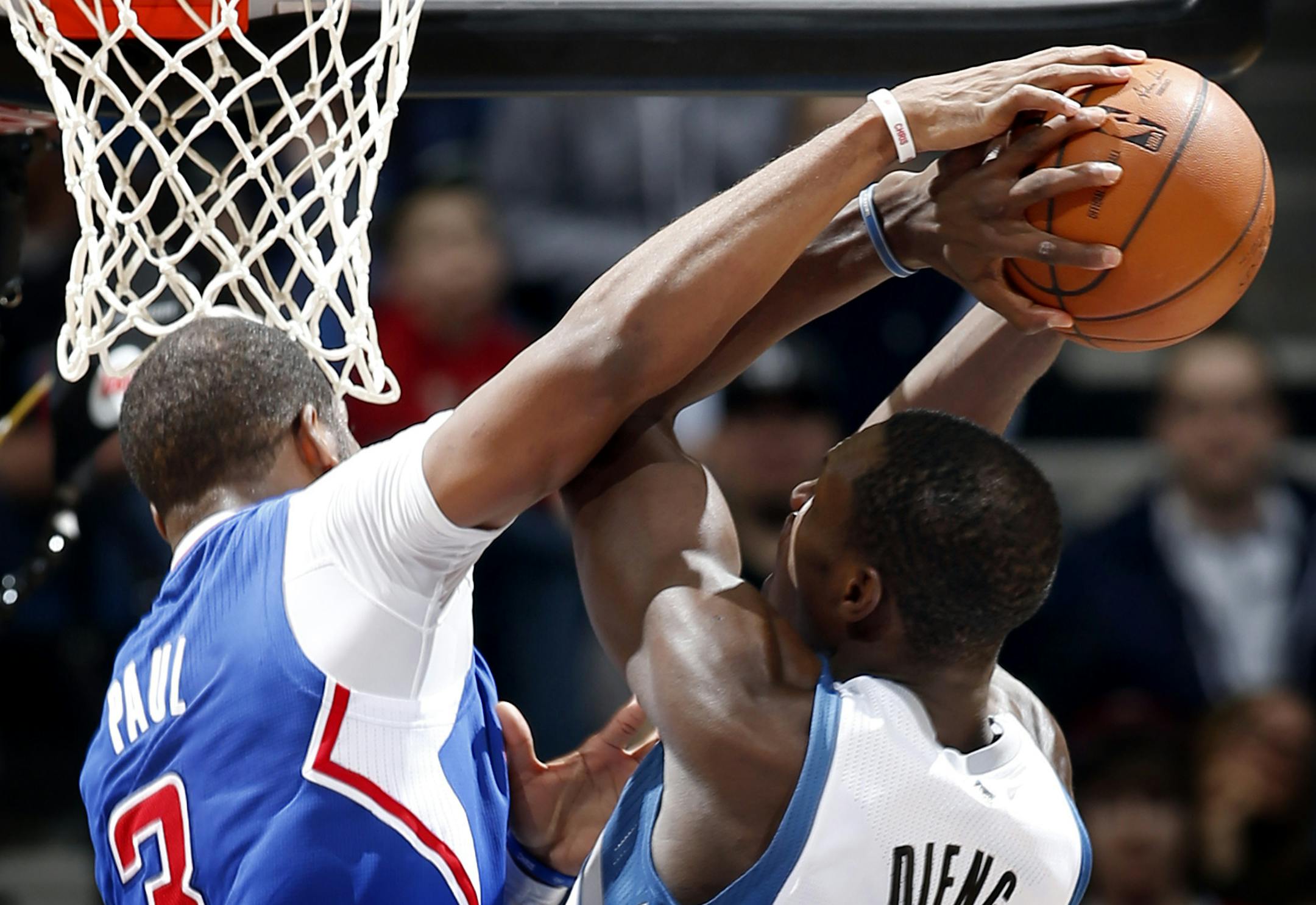 Clippers guard Chris Paul (3) attempted to block a shot by Gorgui Dieng (5) in the fourth quarter. Los Angeles beat Minnesota by a final score of 114-104. ] CARLOS GONZALEZ cgonzalez@startribune.com - March 31, 2014, Minneapolis, Minn., Target Center, NBA, Minnesota Timberwolves vs. Los Angeles Clippers