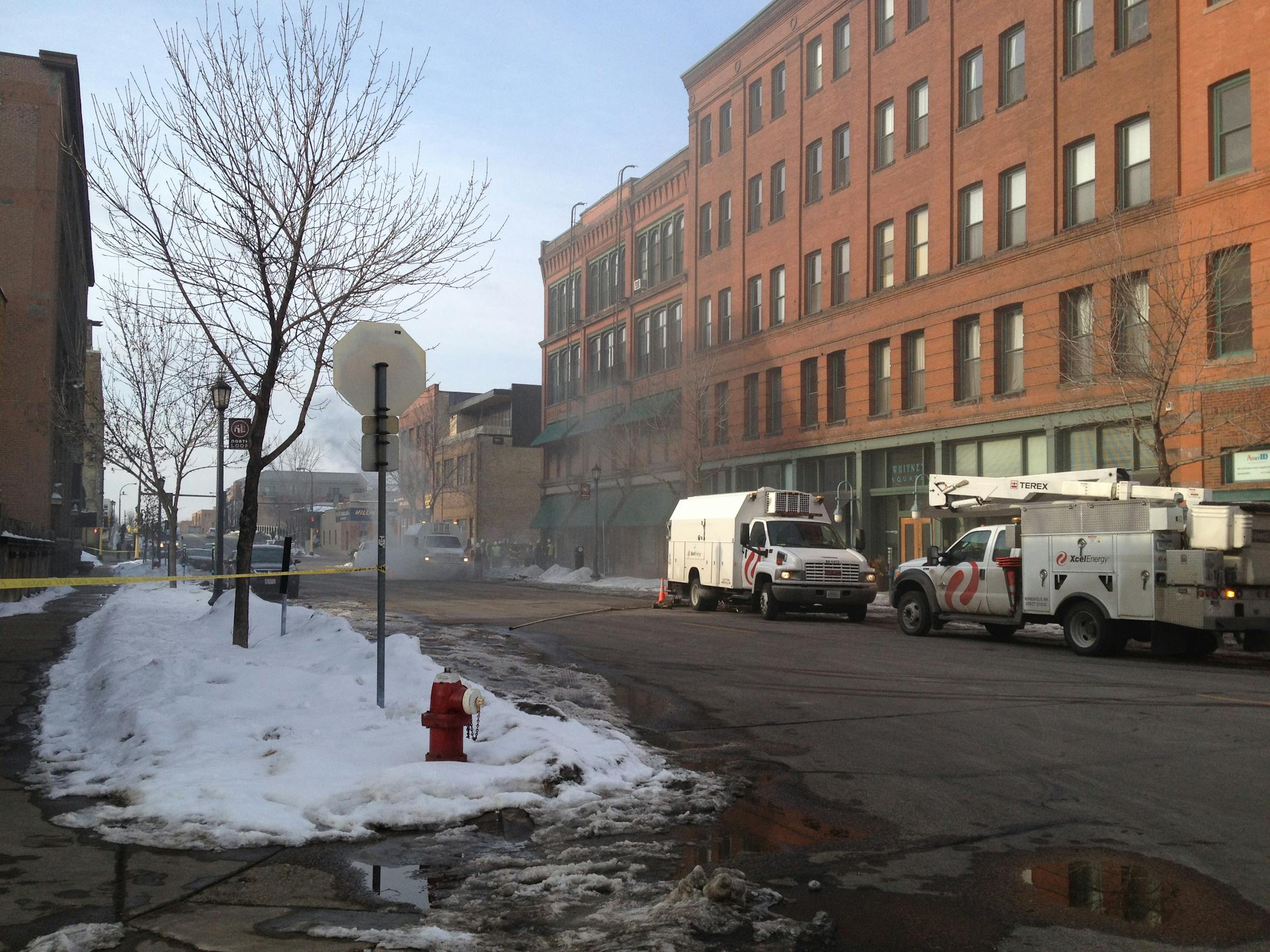 The fire was burning inside a manhole near 210 Second St. N.