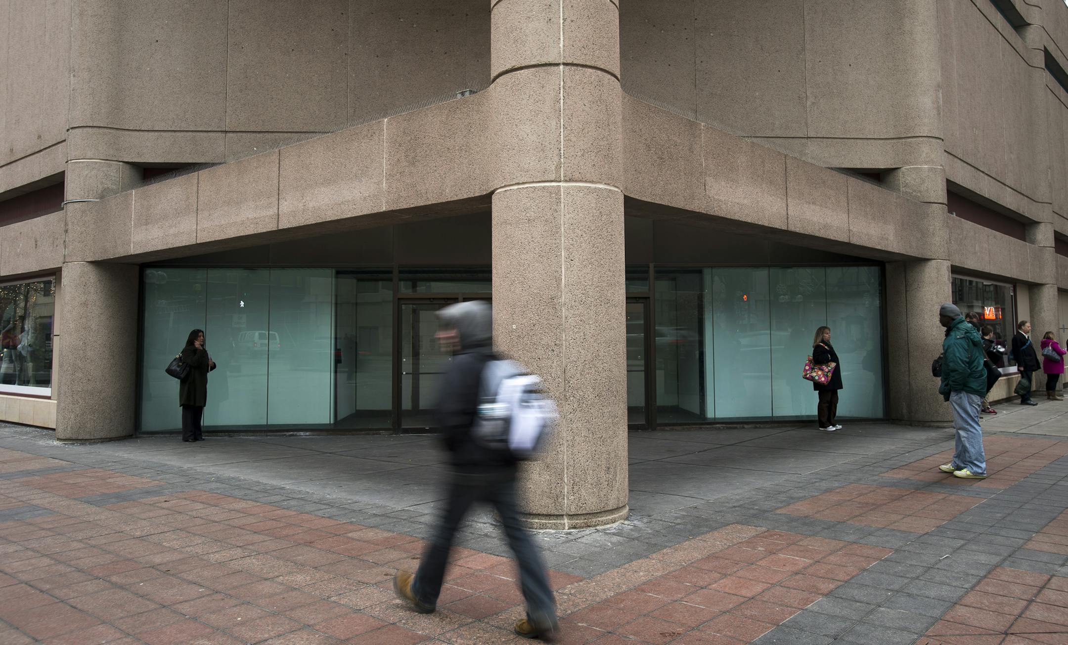 Commuters make their way past the future location of Saks Off 5th at City Center on Tuesday afternoon. ] (Aaron Lavinsky | StarTribune) Saks Off 5th, which closed its downtown Minneapolis location this month, said Tuesday that it will return in April 2016. The outlet store will reopen in City Center, at the same intersection of Nicollet Mall and 6th Street, but across the street from its former location, marking a significant win for the city&#x2019;s downtown vibrancy. The store will occupy two