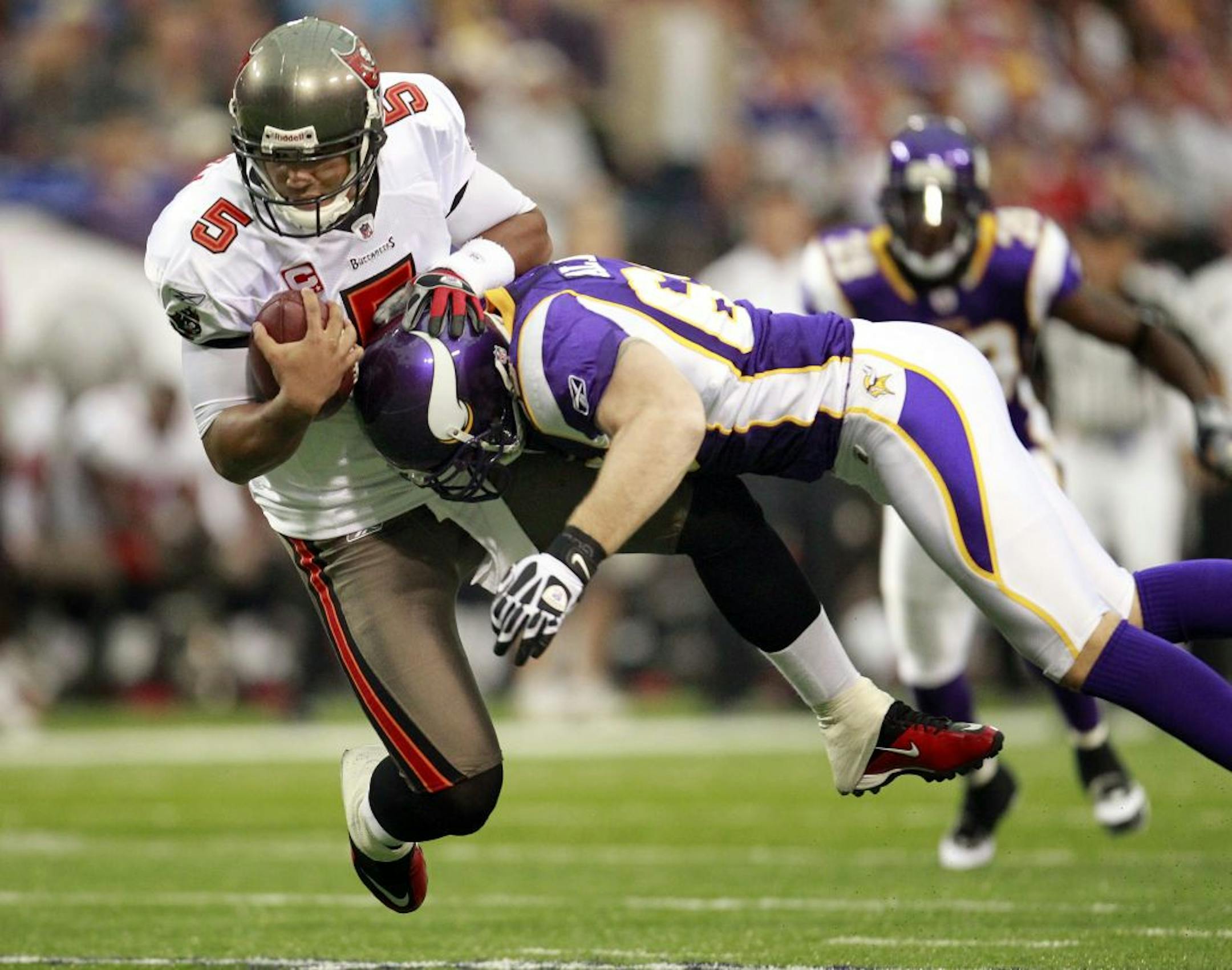 Jared Allen (69) sacked Josh Freeman (5) in the first quarter.