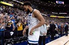 Karl-Anthony Towns of the Timberwolves left the court after Game 5's loss in Denver.