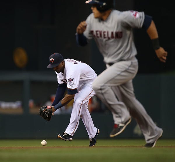Twins Eduardo Nunez bobbled the ball hit by Cleveland's Lonnie Chisenhall in the fourth inning.