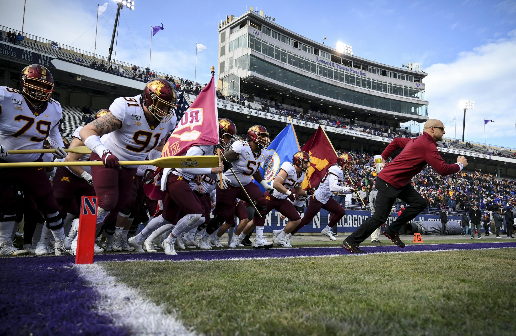 Minnesota Gophers head coach P.J. Fleck led his team onto the field before Saturday's game against the Northwestern Wildcats. ] Aaron Lavinsky • aaron.lavinsky@startribune.com The Minnesota Gophers played the Northwestern Wildcats on Saturday, Nov. 23, 2019 at Ryan Field in Evanston, Ill.