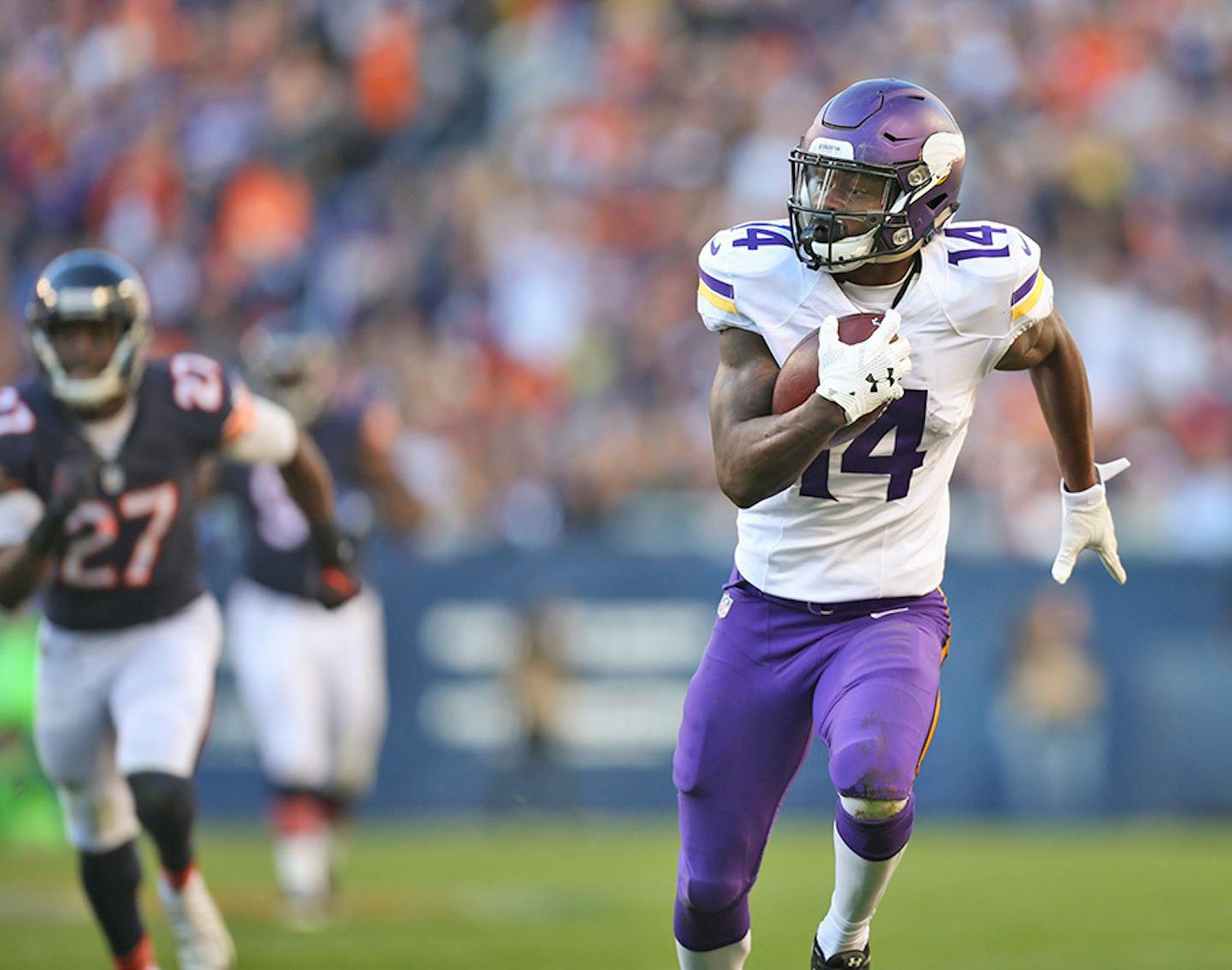 Vikings wide receiver Stefon Diggs (14) headed for the endzone after catching the football for a 40 yard touchdown reception in the fourth quarter Sunday afternoon.