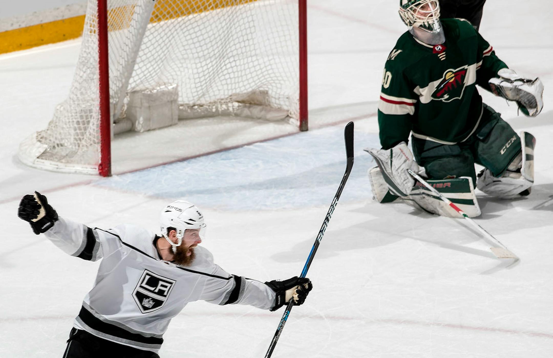 Jake Muzzin (6) celebrated an overtime goal by teammate Jeff Carter.