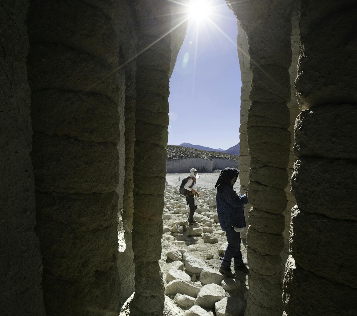 Sunlight shines through the mysterious volcanic columns on the eastern shore of Crowley Lake on Nov. 1, 2015 in Mono County, Calif. (Brian van der Brug/Los Angeles Times/TNS)