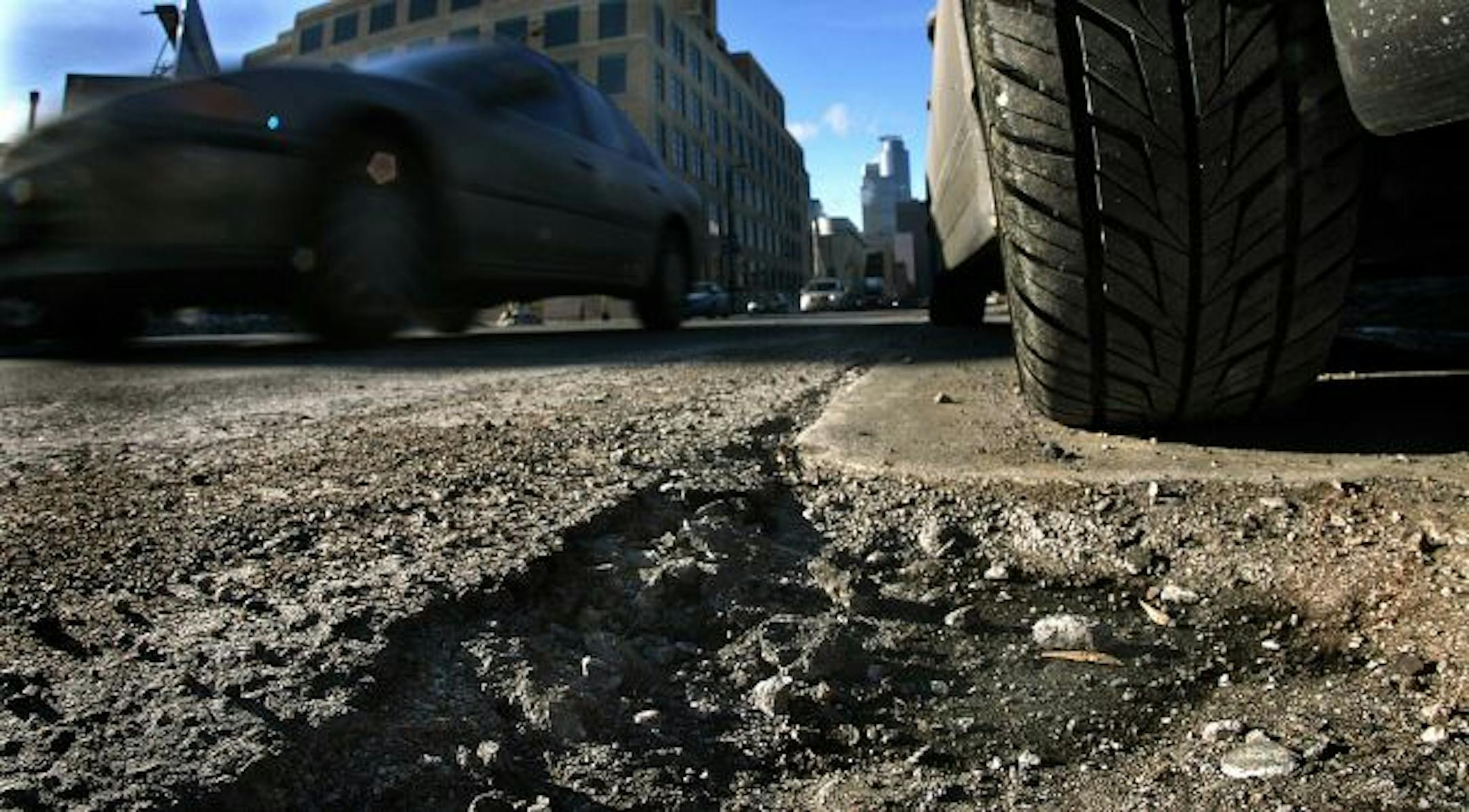 Potholes are abundant in downtown Minneapolis