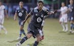 Minnesota United defender Jose Aja (4) drives the ball down tjhe pitch against Real Salt Lake during the second half of a soccer match in Kissimmee, F