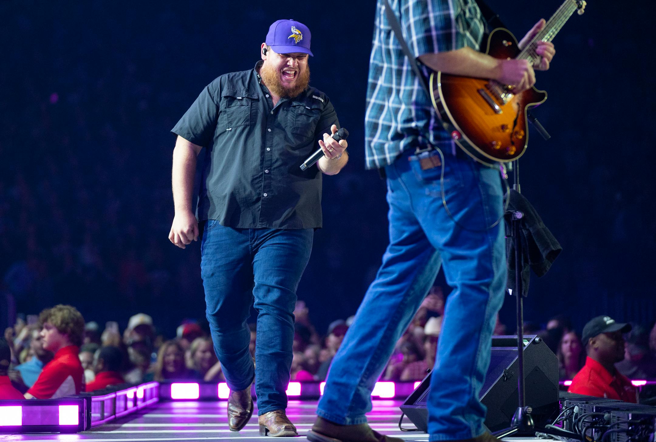 Luke Combs performs at U.S. Bank Stadium.