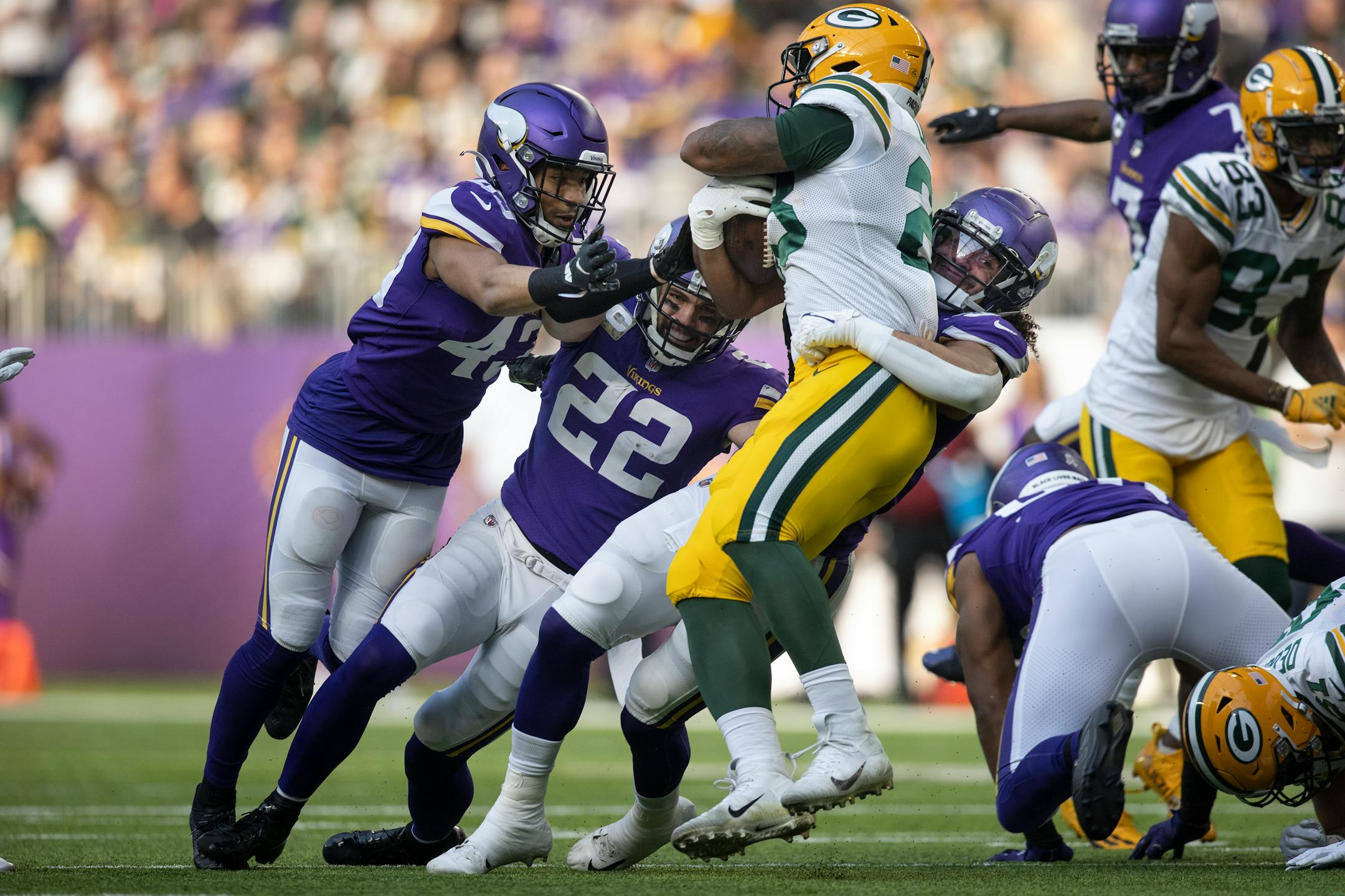 Minnesota Vikings middle linebacker Eric Kendricks (54) tackles Green Bay Packers running back A.J. Dillon (28) in the first quarter.