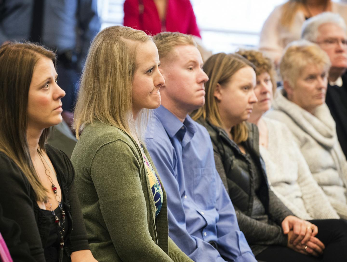 Cassie Hansen's family watches the ceremony, including her sisters Ashley Withrow, from right, and Brittany Koller. ] LEILA NAVIDI &#xef; leila.navidi@startribune.com BACKGROUND INFORMATION: Thirty-six years after 6-year-old Cassie Hansen was kidnapped, strangled and left in dumpster, the team of officers and a civilian will be recognized for breaking one of St. Paul's most infamous murder cases during a ceremony at St. Paul Police Department's Western District office on Wednesday, December 13,