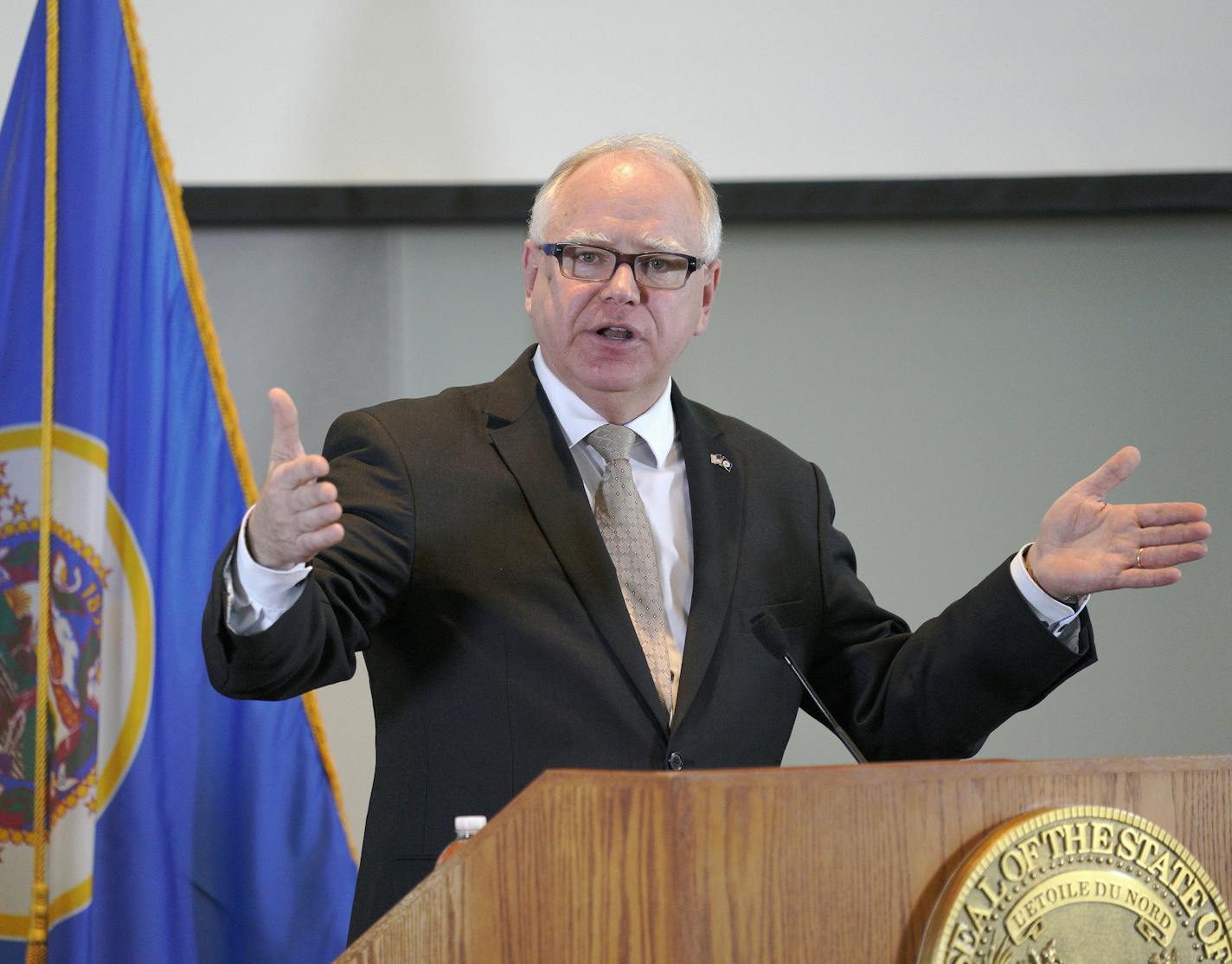 Minnesota Gov. Tim Walz speaks during a press conference Tuesday, Feb. 19, 2019, in St. Paul, Minn. Walz has proposed a $49 billion budget that includes a 20-cent hike in the state's gasoline tax along with significant increases in aid to local school districts. (Brian Peterson/Star Tribune via AP)