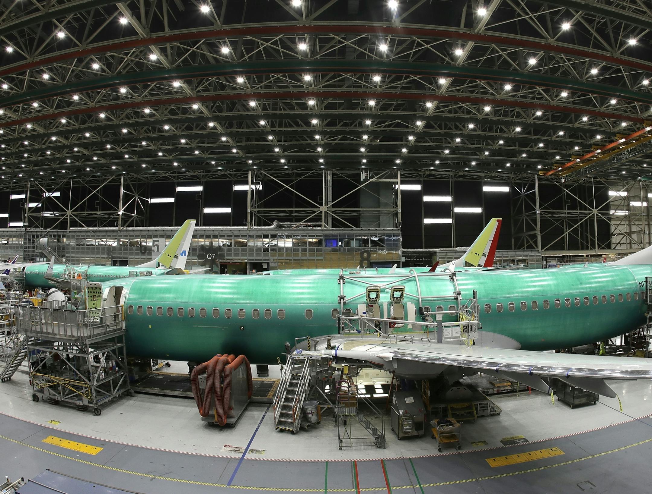 FILE- In this March 27, 2019, file photo, a Boeing 737 MAX 8 airplane is shown on the assembly line during a brief media tour in Boeing's 737 assembly facility, in Renton, Wash. Flyadeal, a Saudi budget carrier says it is ordering 30 new Airbus planes, replacing a $6 billion agreement it had with Boeing for its troubled 737 MAX jets, which are grounded around the world after two crashes. (AP Photo/Ted S. Warren, File)
