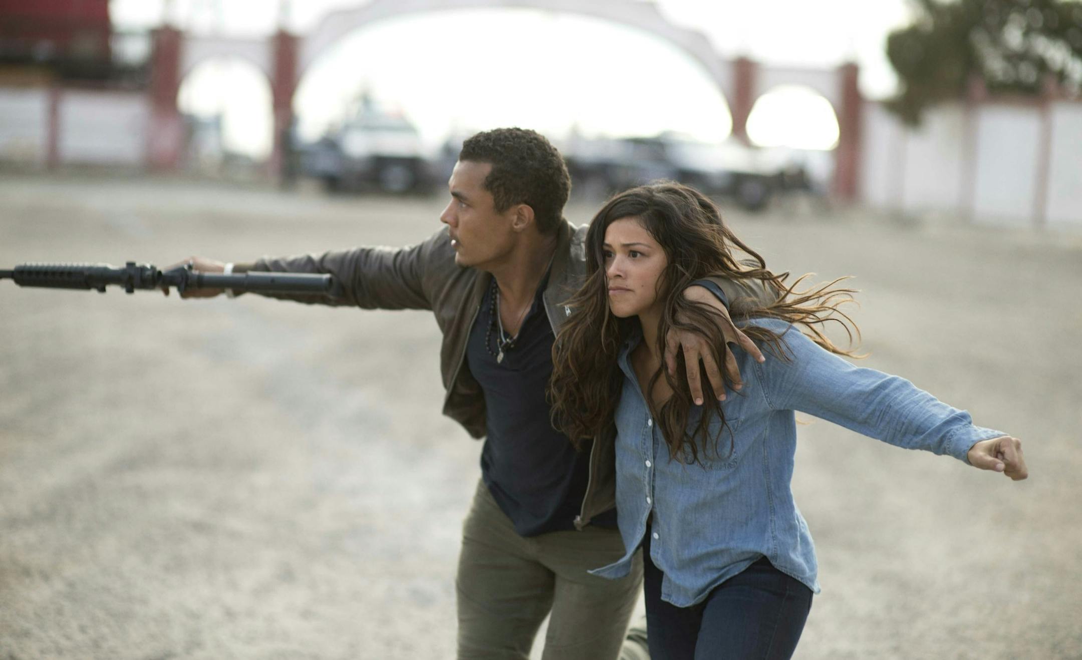 This image released by Sony Pictures shows Ismael Cruz, left, and Gina Rodríguez in a scene from "Miss Bala." (Gregory Smith/Sony Pictures via AP)