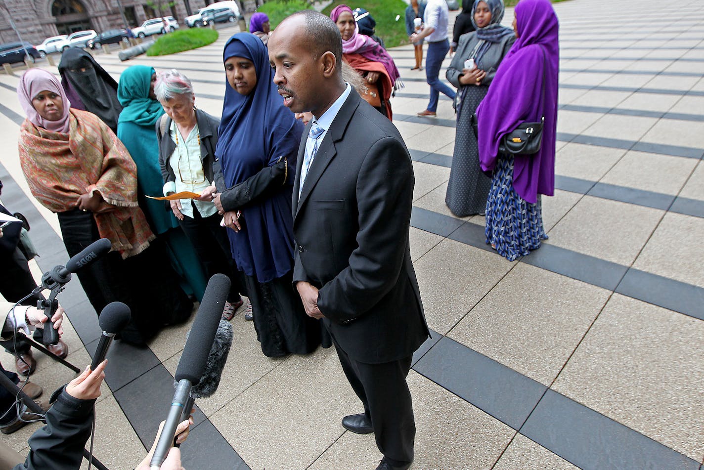 Somali Community Leader Sadik Warfa spoke on behalf of the mothers and family members after the opening day of the ISIL recruit trial, in front of the United States Courthouse, Monday, May 9, 2016 in Minneapolis, MN. ] (ELIZABETH FLORES/STAR TRIBUNE) ELIZABETH FLORES &#x2022; eflores@startribune.com