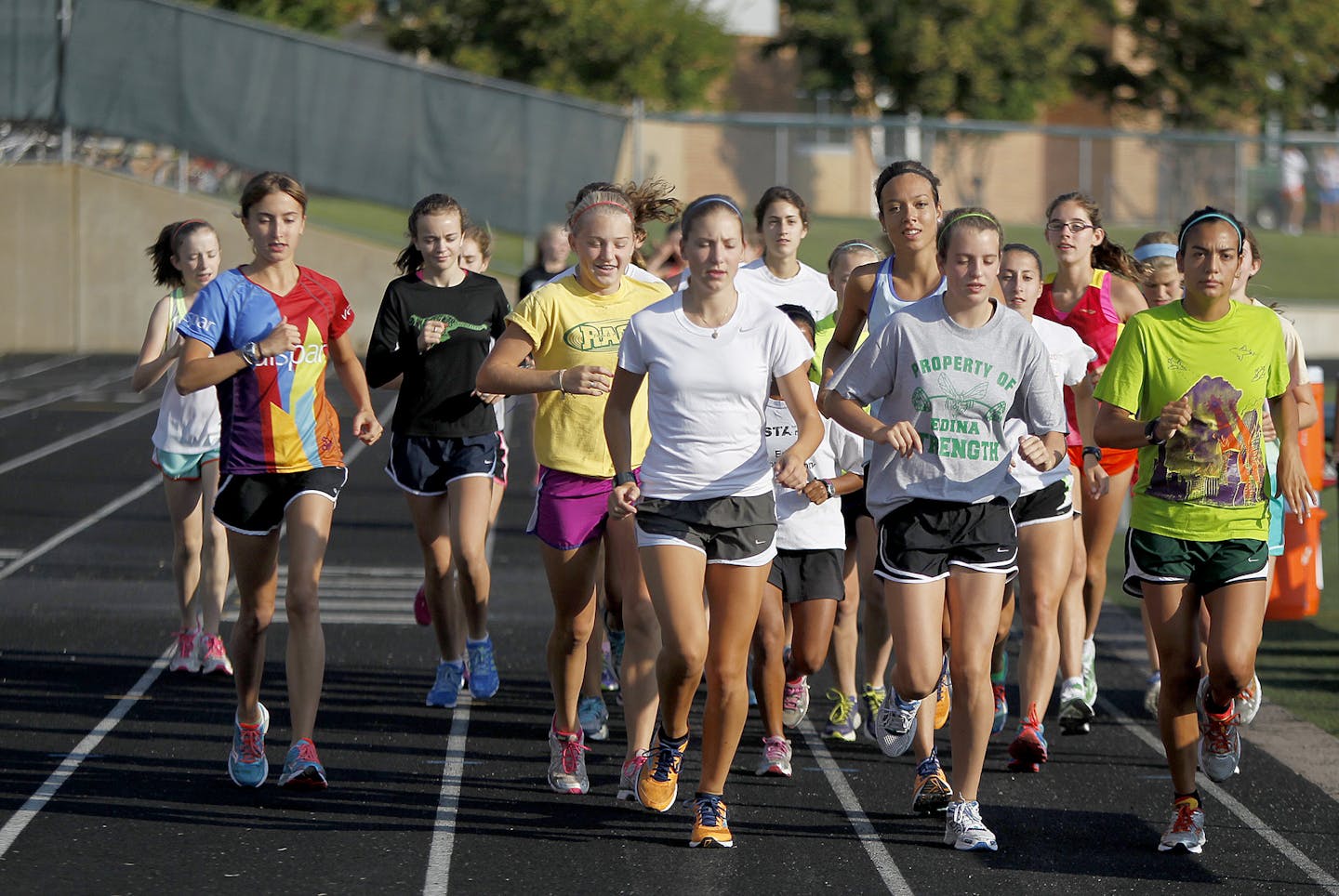 The Edina girls cross-country team practiced early Friday at the Edina Community Center, August 16, 2013 in Edina, MN. The team finished third in the Class 2A state meet in 2012. A strong freshman class and the return of junior Shannon Spalding, far right, who was 9th last year, make Edina a legit contender for a state title. (ELIZABETH FLORES/STAR TRIBUNE) ELIZABETH FLORES &#x2022; eflores@startribune.com