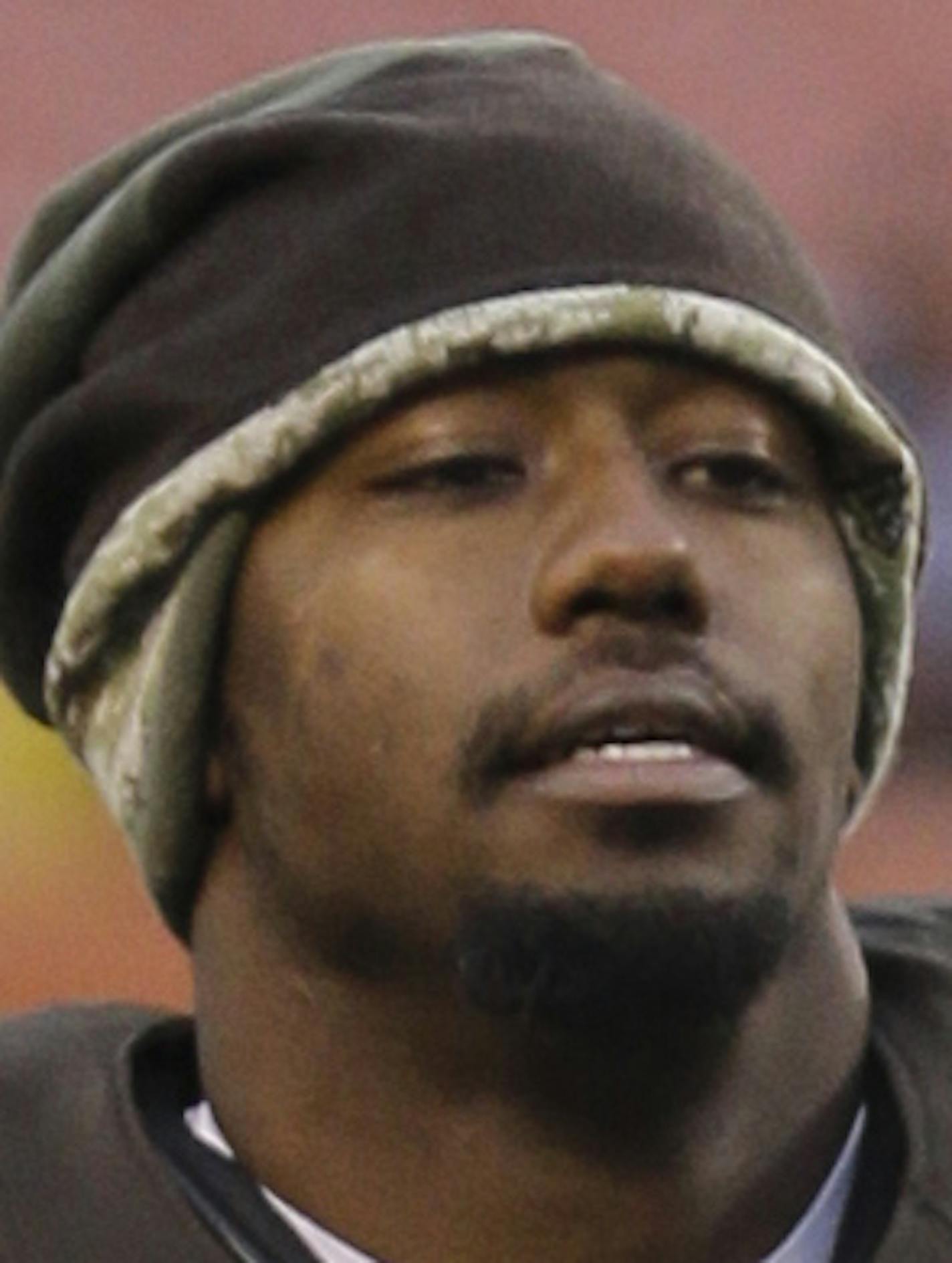 Cleveland Browns running back Ben Tate jogs off the field after a 23-7 loss to the Houston Texans in an NFL football game Sunday, Nov. 16, 2014, in Cleveland. (AP Photo/Tony Dejak)