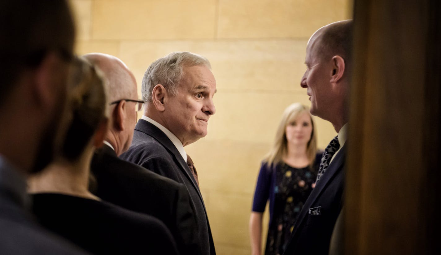 Senate Majority Leader Paul Gazelka spoke with Governor Mark Dayton as the Governor he left the budget announcement press conference. ] GLEN STUBBE &#x2022; glen.stubbe@startribune.com Wednesday, February 28, 2018 Management and Budget Commissioner Myron Frans presented the February budget forecast which projected a $329 million budget surplus. Gov. Dayton and legislative leaders all predict a surplus. One of the big questions this session will be what to do with the money. Spending proposals ar