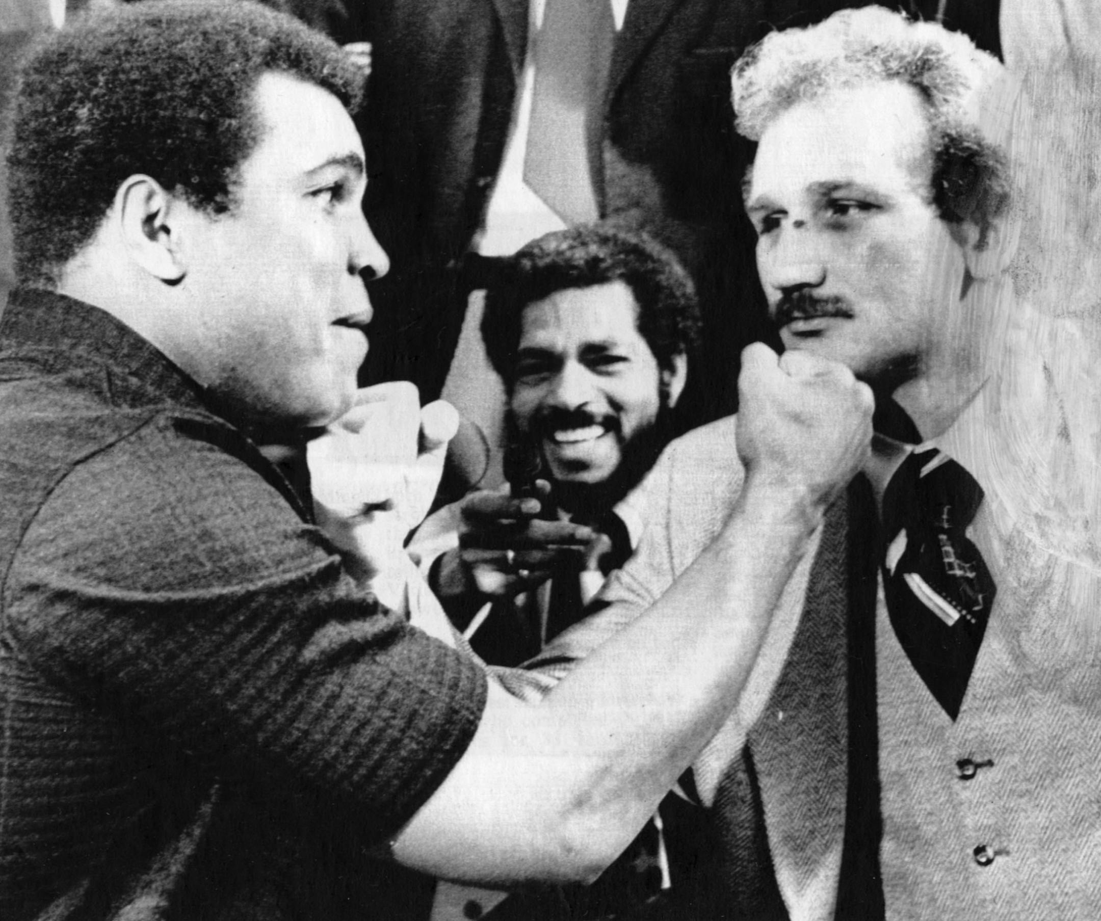 JMuhammed Ali and Scot Ledoux Playfully square off to promote and upcomeing fight. 10-25-77 UPI file photo.