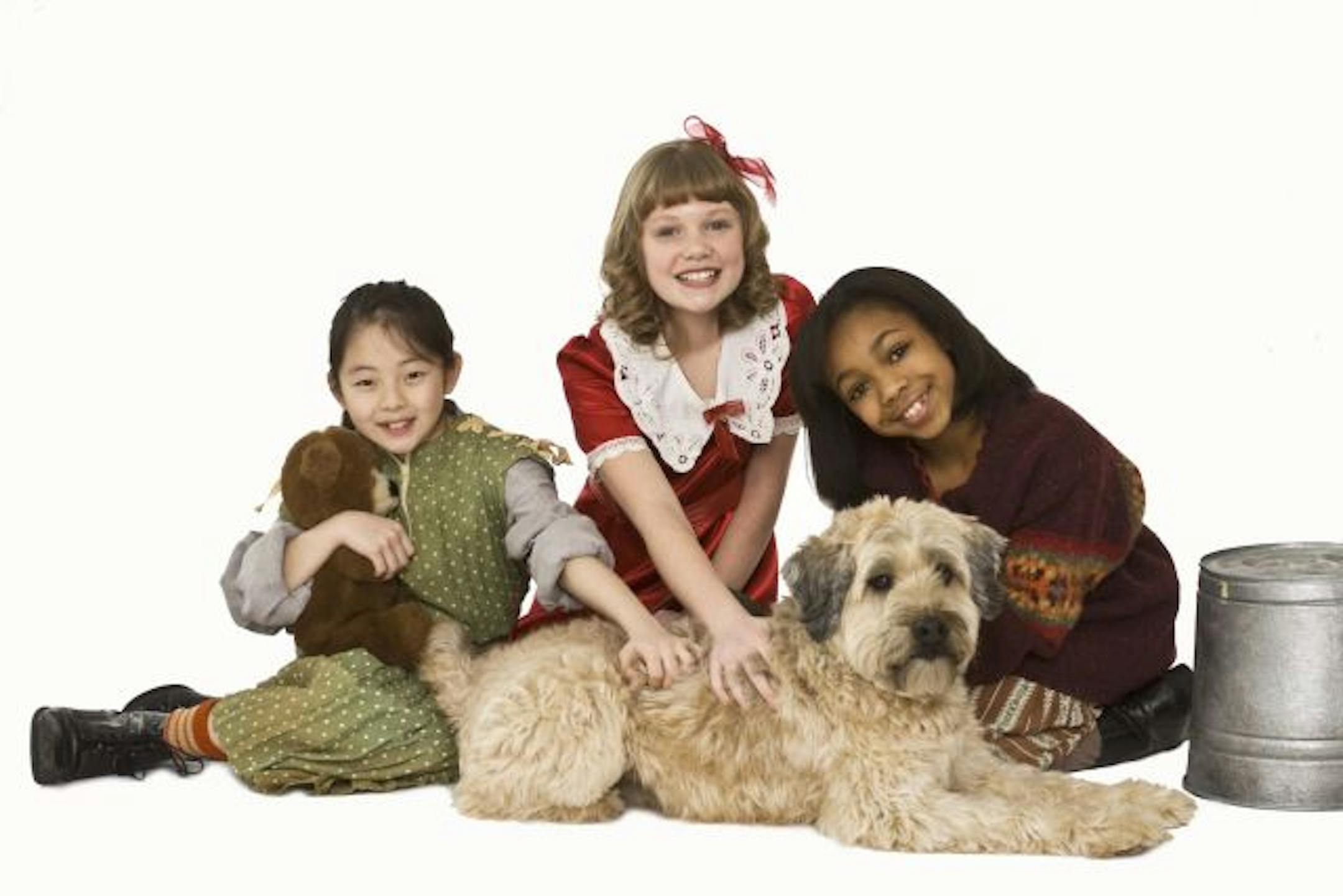 Panu Yang, Megan Fischer as Annie and Jade Mone Stumon in "Annie" at the Children's Theatre Company.