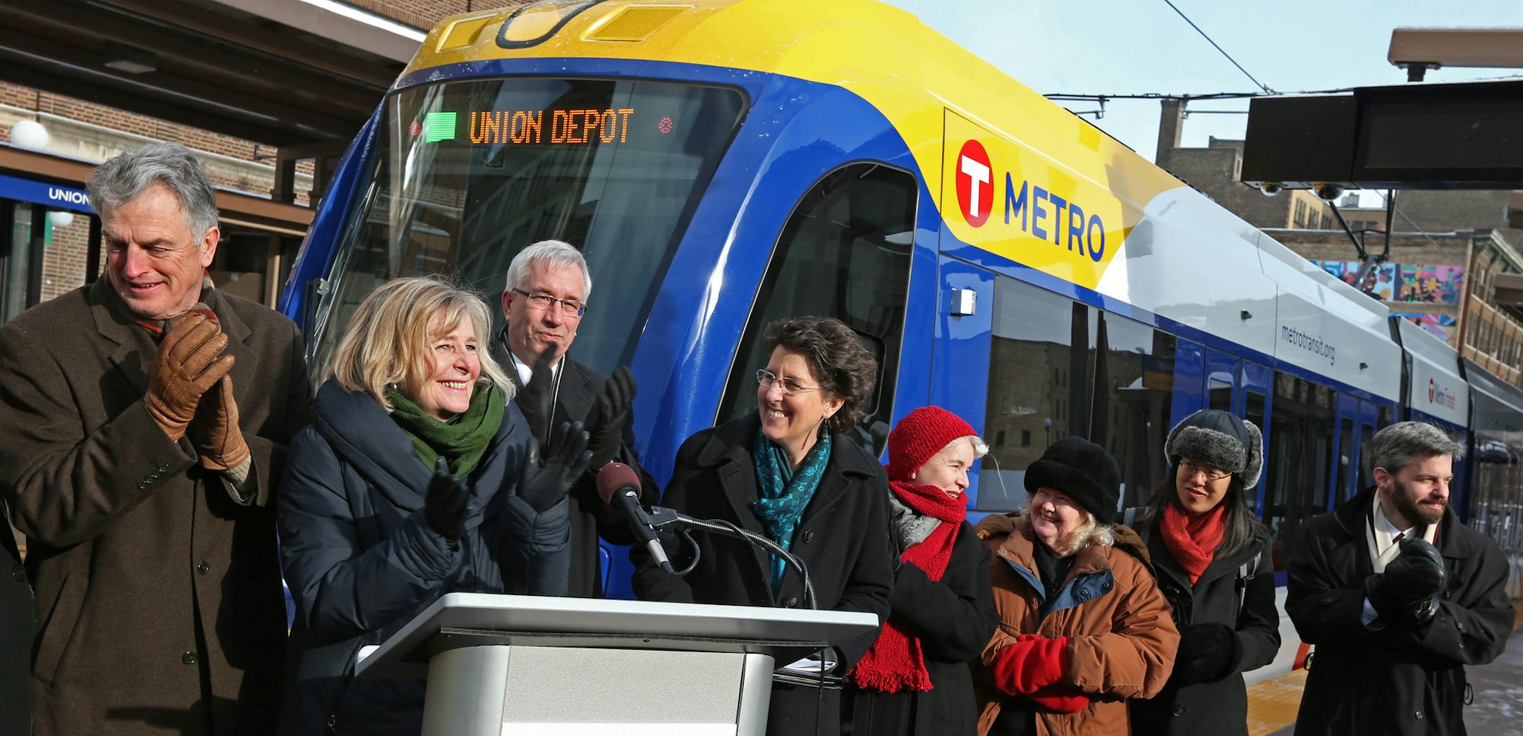 (left) Metropolitan Council Chair Susan Haigh and other officials applauded the workers who built the light rail green line, as it was announced that service will start Saturday June 14th between Minneapolis and St. Paul. The announcement was made during a press conference in front of the Union Depot in downtown St. Paul on 1/22/14.] Bruce Bisping/Star Tribune bbisping@startribune.com Susan Haigh/source.
