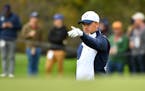 Team USA's Jordan Spieth gestured to teammates at the 11th hole during Ryder Cup practice play Wednesday at Hazeltine.