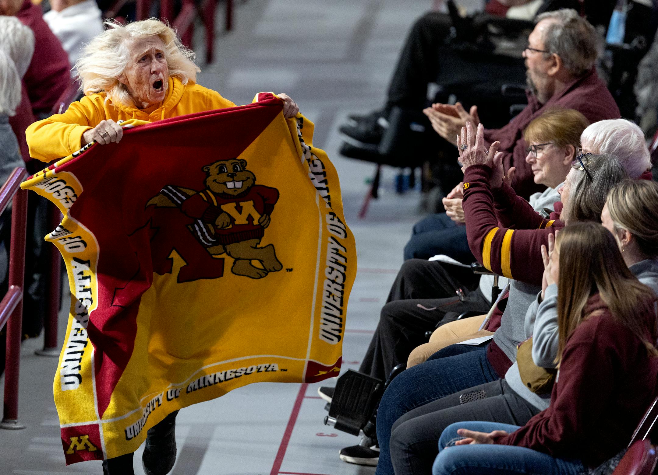 Vicky Nelson "The Blanket Lady" during the third quarter Wednesday, November 8, 2023, at Williams Arena in Minneapolis, Minn. ] CARLOS GONZALEZ • carlos.gonzalez@startribune.com