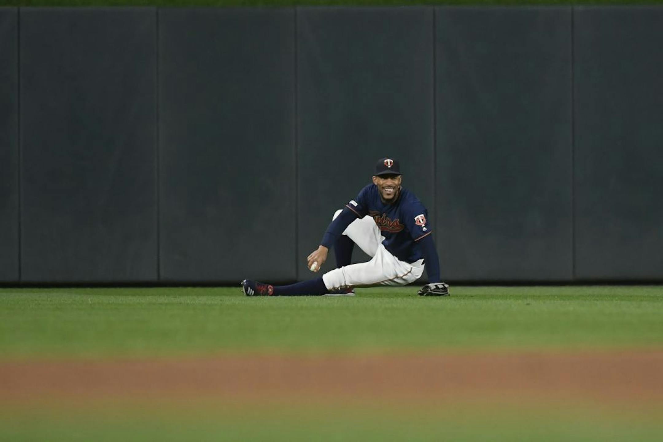 Minnesota Twins center fielder Byron Buxton (25) reacted after catching a fly ball hit by Detroit Tigers left fielder Brandon Dixon (12) in the top of the eighth inning.