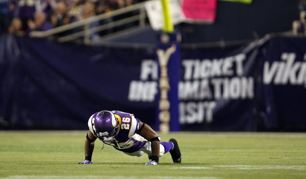 Vikings cornerback Antoine Winfield did a set of pushups after dropping a would-be interception in the second quarter.
