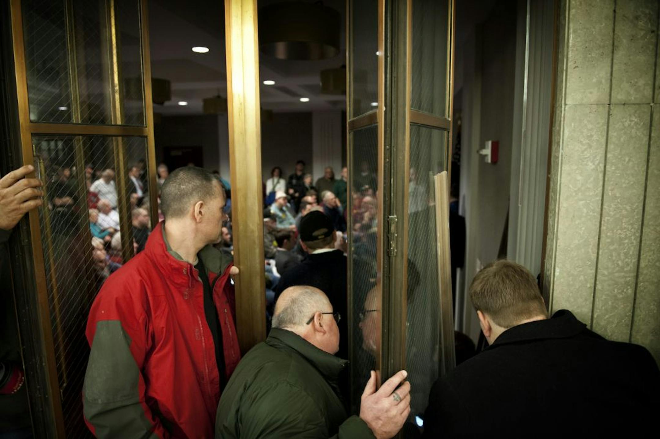 Even the overflow rooms were packed with people trying to watch the first day of testimony for gun legislation at the State Capitol. The House Public Safety Finance and Policy Committee began three days of hearings into a dozen bills aimed at preventing gun violence.